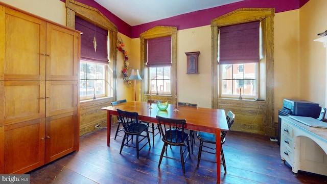 dining area featuring dark hardwood / wood-style floors