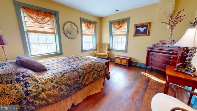 bedroom featuring dark hardwood / wood-style floors