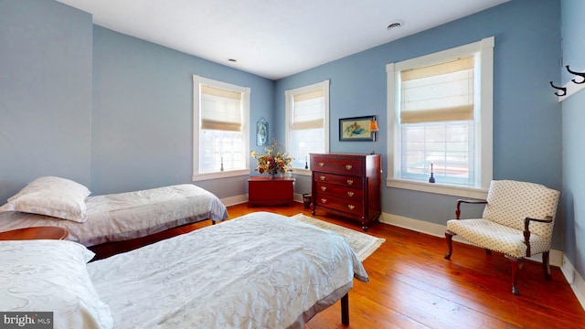 bedroom featuring wood-type flooring