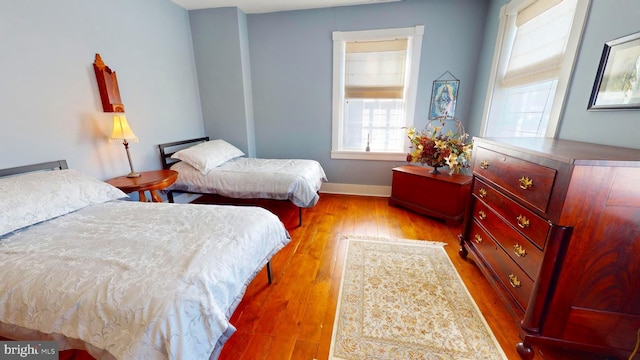 bedroom featuring light hardwood / wood-style floors