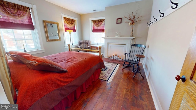 bedroom featuring dark hardwood / wood-style floors