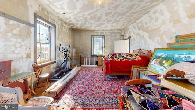 sitting room featuring carpet flooring