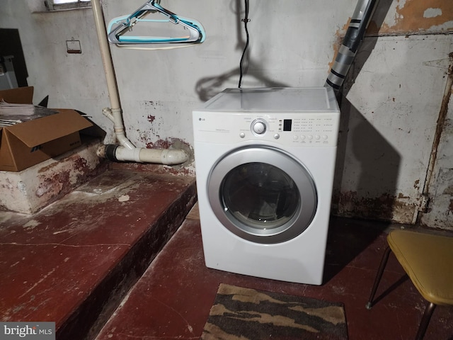 laundry room featuring washer / dryer