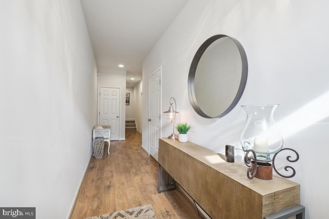 hallway featuring light hardwood / wood-style flooring