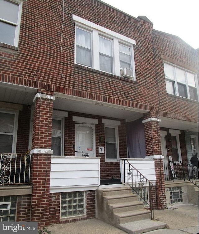 view of front of home featuring cooling unit