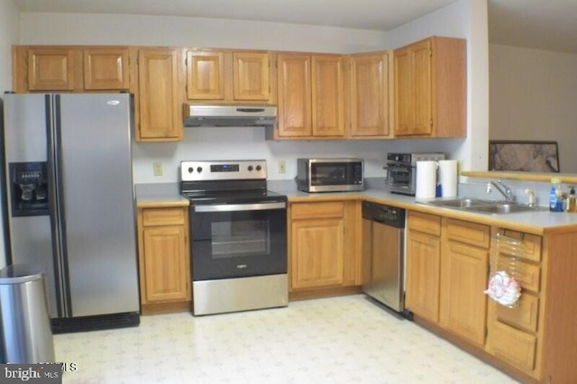 kitchen with stainless steel appliances and sink