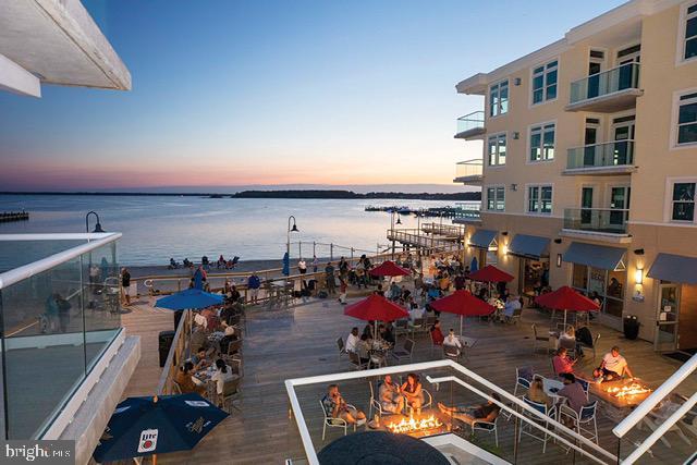 view of water feature with an outdoor fire pit