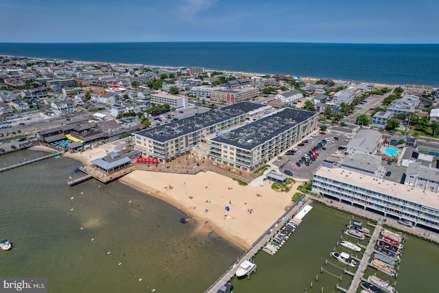 aerial view with a view of the beach and a water view