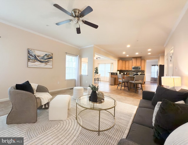 tiled living room featuring crown molding and ceiling fan