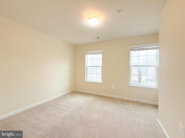 view of carpeted spare room