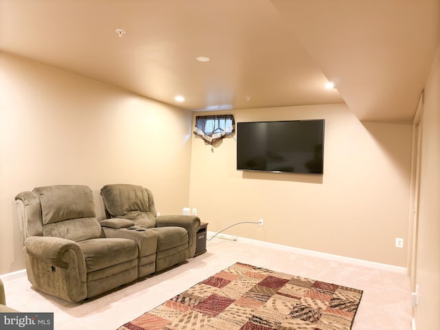 home theater room featuring carpet flooring