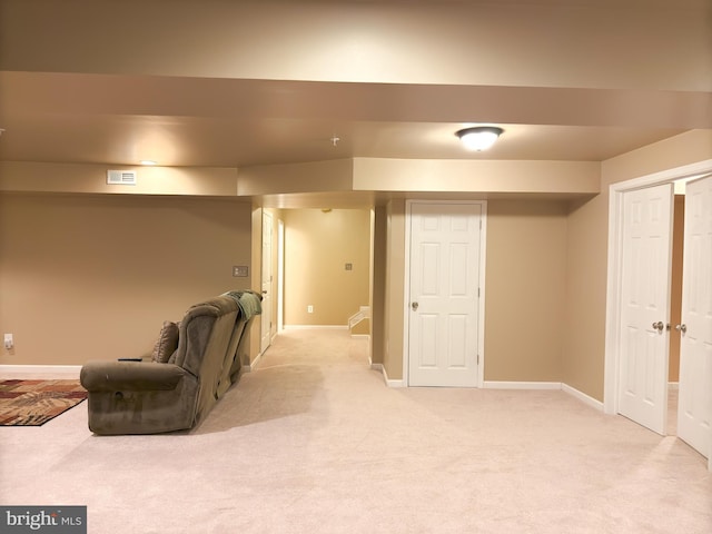 basement with light colored carpet