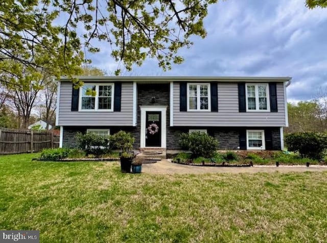 6406 Holyoke Dr, Annandale, VA 22003 - split foyer home featuring a front lawn and fence