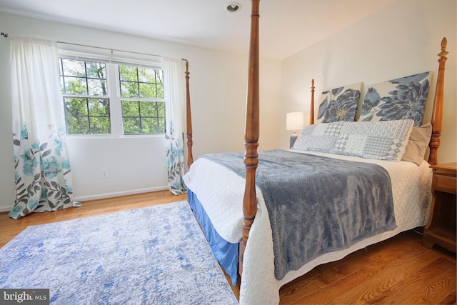 6406 Holyoke Dr, Annandale, VA 22003 - bedroom featuring baseboards and wood finished floors