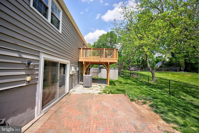 6406 Holyoke Dr, Annandale, VA 22003 - view of patio featuring a fenced backyard, a wooden deck, and cooling unit