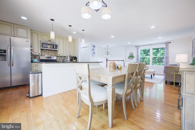 6406 Holyoke Dr, Annandale, VA 22003 - dining space with recessed lighting and light wood-style flooring