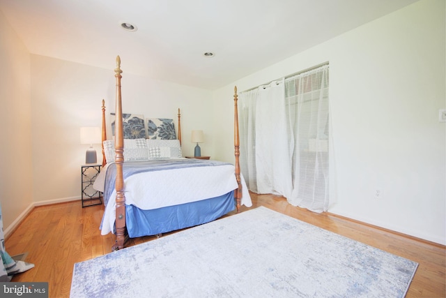 6406 Holyoke Dr, Annandale, VA 22003 - bedroom featuring baseboards and wood finished floors