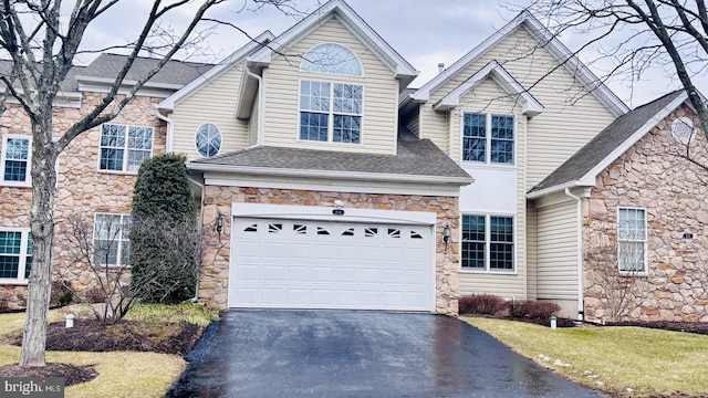 front of property featuring a garage