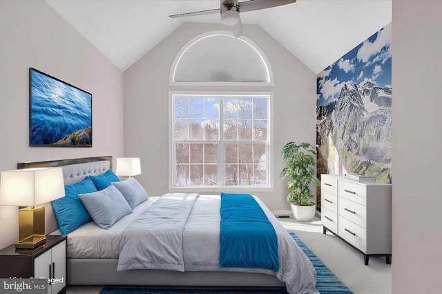 bedroom featuring ceiling fan, lofted ceiling, and carpet