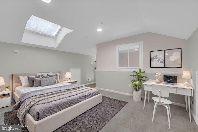 bedroom featuring lofted ceiling with skylight