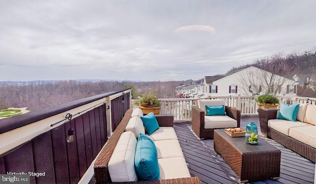 wooden deck featuring an outdoor living space