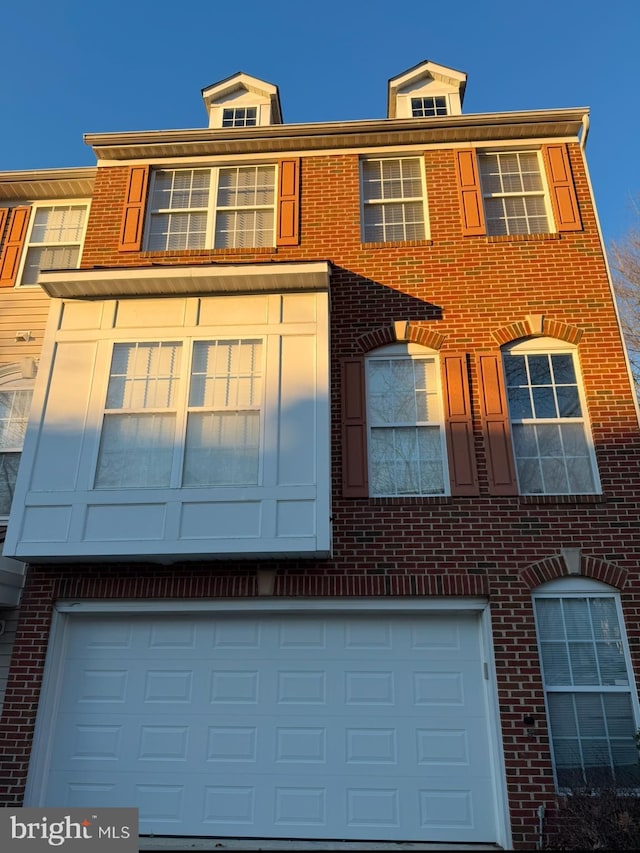 view of property featuring a garage