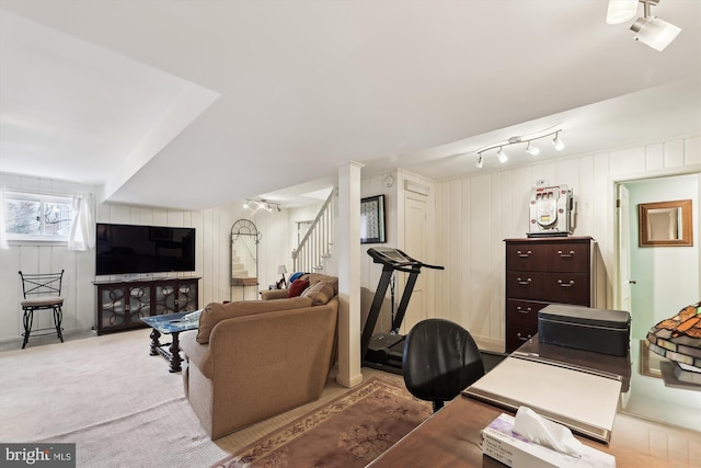 living room featuring light colored carpet