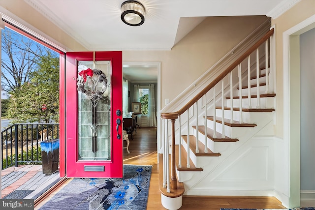 entryway with wood-type flooring