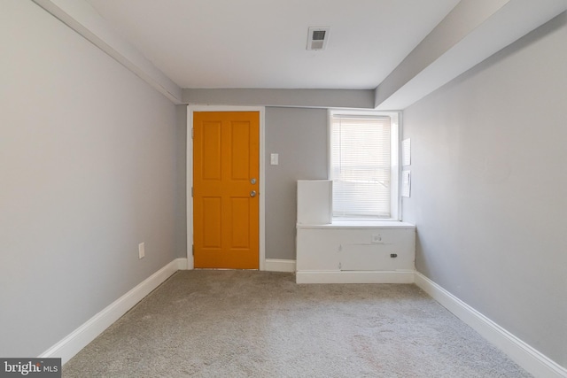 unfurnished bedroom with carpet floors