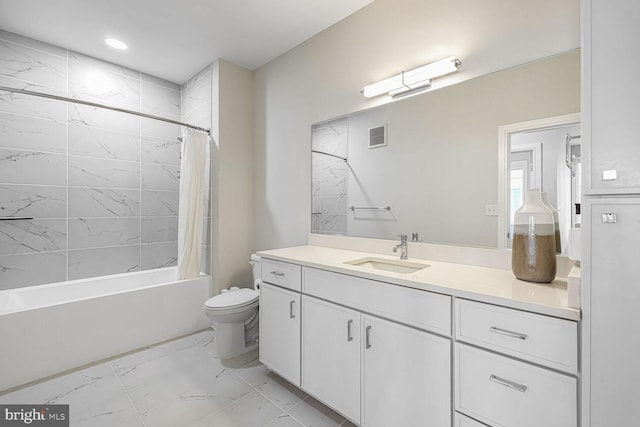 full bathroom with shower / bath combo, vanity, and toilet