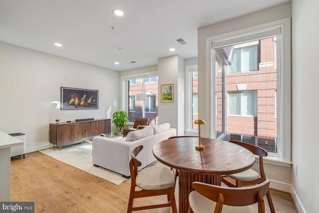 dining room featuring light hardwood / wood-style floors