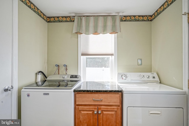 laundry area featuring independent washer and dryer