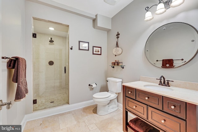 full bath featuring toilet, a shower stall, baseboards, and vanity