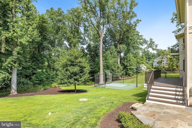 view of yard with a deck