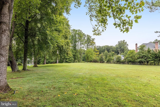 view of yard featuring fence