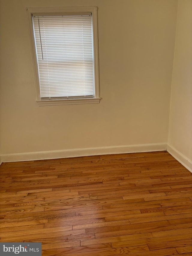 empty room with light wood-type flooring