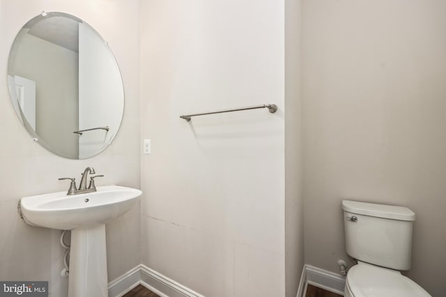 bathroom with sink and toilet