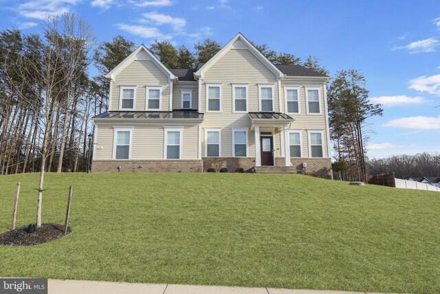 view of front of house with a front yard