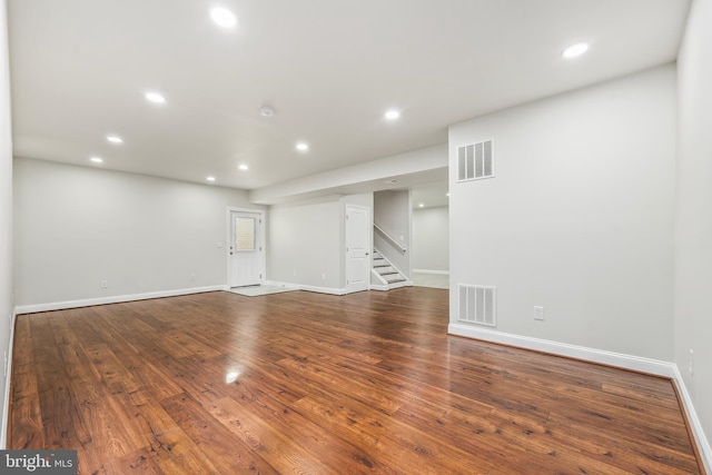 unfurnished room with hardwood / wood-style floors