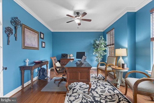 office area featuring baseboards, ornamental molding, and wood finished floors