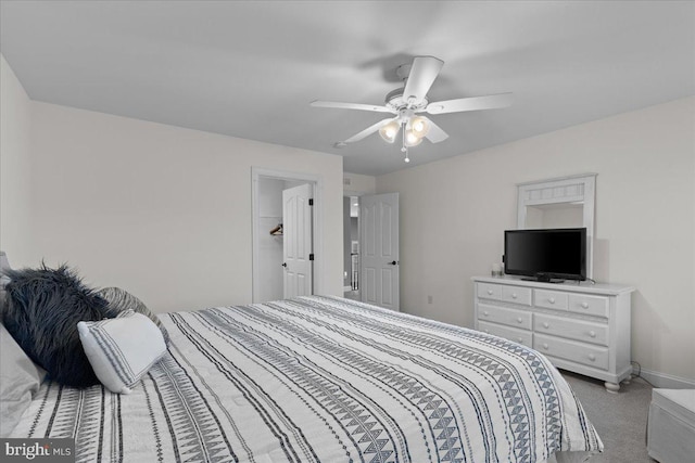 bedroom featuring carpet, baseboards, and ceiling fan