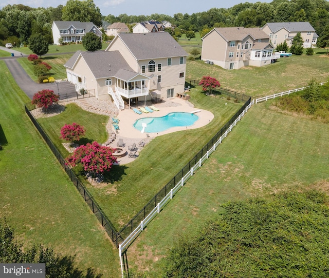 birds eye view of property with a residential view