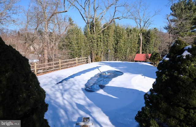 view of yard covered in snow