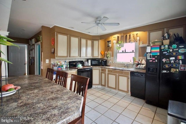 kitchen featuring light tile patterned floors, sink, ceiling fan, black appliances, and light brown cabinets