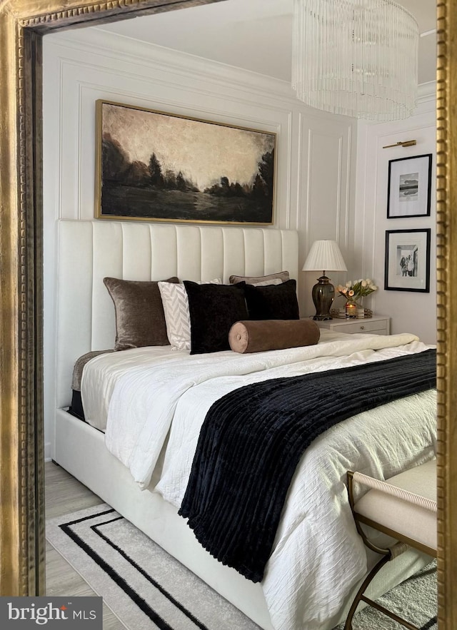 bedroom featuring light wood-type flooring