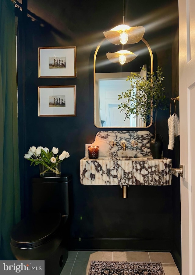 bathroom featuring tile patterned flooring