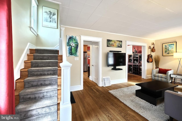 living room with dark hardwood / wood-style floors