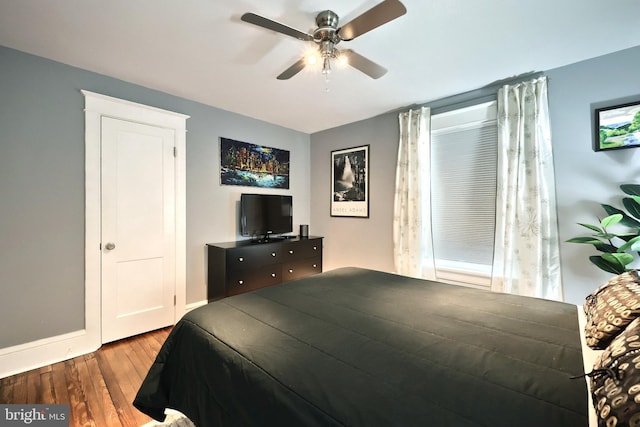 bedroom with ceiling fan and light wood-type flooring