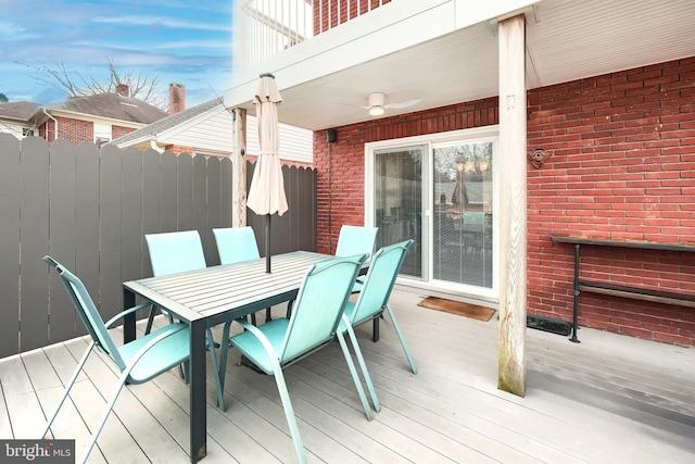 wooden deck with ceiling fan