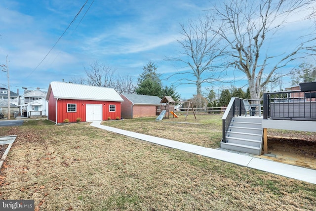 exterior space featuring an outbuilding and a playground